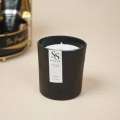 A simple, elegant scented candle from a men's birthday hamper. I select high-quality items that complement the overall theme of the gift.