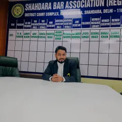 In the Shahdara Bar Association office at the Karkardooma court complex. This is where I strategize and prepare for cases like mutual consent divorce and domestic violence protection orders.
