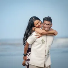 A playful piggyback ride by the sea. Pre-wedding shoots are all about having fun and being yourselves, and this photo is full of happy, carefree energy.