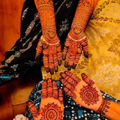 The beautiful dark stain of my mehndi on two clients, perfect for celebrating any festival like Diwali or Eid together.