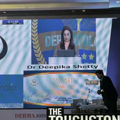 A view from the audience during my presentation. My goal in these talks is to provide practical insights that other doctors can apply in their own practices to improve patient outcomes.