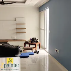 The same living room, showing how the accent wall creates a distinct zone in an open-plan space.