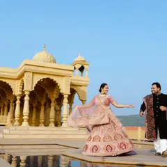 A majestic backdrop for a love story that feels like royalty. I focus on capturing movement and emotion, making you feel like the main characters in your own romantic film. This shot was taken at a stunning architectural location near Pune.