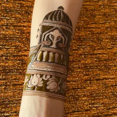 The design taking shape. This is the mid-stage of the application, where the outlines are filled and shading is added to create depth.