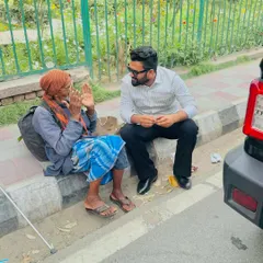 A moment of connection on a Delhi sidewalk. I believe true wealth lies not in riches, but in understanding the lives of the people, the very individuals we aim to serve.