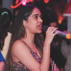 The focus and emotion of a true performer. Every singer gets their moment to shine.