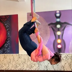 This inverted butterfly pose, or Baddha Konasana, is a wonderful hip opener. The hammock allows you to relax into the stretch while gravity does the work.