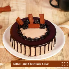 Take a break with this KitKat and Chocolate Cake. A moist chocolate cake is surrounded by a rich chocolate drip and topped with pieces of the iconic crunchy wafer, making it a hit with all ages.