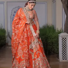 The way the dupatta drapes and flows adds to the grandeur of this Abhinav Mishra creation. I ensure every element of the outfit moves beautifully.