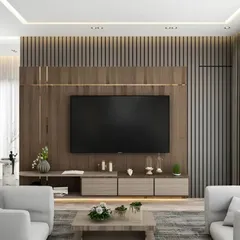 This floor-to-ceiling TV unit uses dark wood slats and a simple floating console to create a powerful statement. The design is both elegant and functional, anchoring the entire living space.