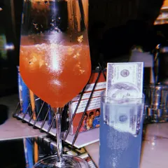 This was the 'King Kunta' cocktail, inspired by Kendrick Lamar. It was bold, smooth, and incredibly Instagrammable, served with a prop dollar bill. The presentation was kickass and completely unexpected, which is exactly the kind of detail I love to capture.