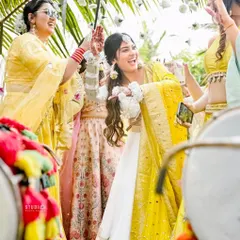 The bride, TV actress Krishna Mukherjee, having a blast during her vibrant Haldi ceremony in Goa. We choreographed the entry and dance sequences to be full of joy and color.