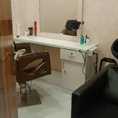 Another view of my clean and well-equipped styling area. I have everything needed to provide a professional hair replacement service in a comfortable setting.