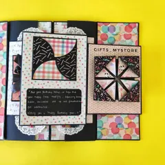 A closer look at some of the intricate card mechanisms I use in my scrapbooks, like the shutter card and twist-and-pop card.