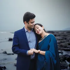 A tender, candid moment between a couple on the beach. This close-up captures the genuine emotion and connection that I strive for in my pre-wedding photography.