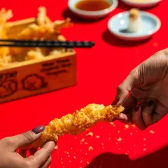 Another interactive shot with shrimp tempura for Harajuku Tokyo Cafe, focusing on the texture of the food.