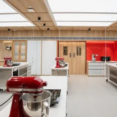 We believe in using the best tools for the job. This close-up shows the professional-grade KitchenAid mixers and other equipment that kids get to use during our camps, giving them a true-to-life baking experience.