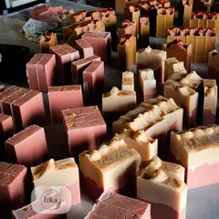 A sea of freshly cut soap bars, each one perfectly imperfect. This image captures the beautiful textures and colors of my small-batch production. This is what pure, unadulterated luxury looks like before it's packaged.
