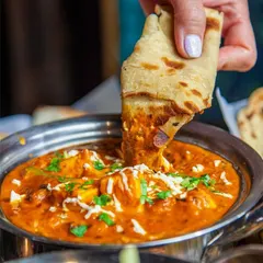 There's nothing like dipping a warm, soft roti into a creamy paneer curry. This is our Paneer Butter Masala, a crowd favourite, prepared with fresh paneer and a rich, flavourful tomato gravy.