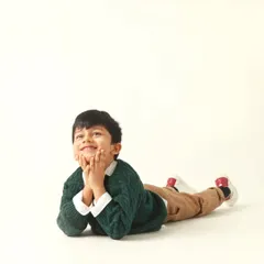 A dreamy, thoughtful expression from a five-year-old. It's amazing to see how their personalities develop over the years.