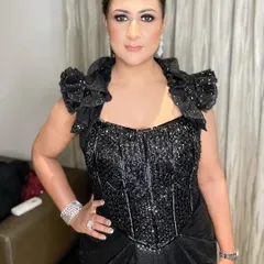 A confident pose that showcases the power of a great smokey eye. This makeup is designed for turning heads and owning the night.