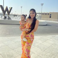 Creating precious moments in matching outfits. Here I am with my daughter in a vibrant pink and yellow floral co-ord set, a perfect example of our custom twinning service for mothers and their little ones.