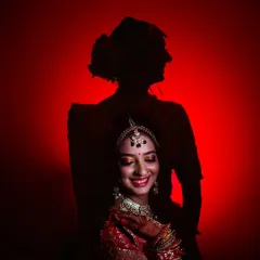 A creative shadow portrait of a bride. I use dramatic lighting to create artistic and memorable shots like this one.