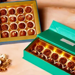 We offer our truffle boxes in different sizes and colors to suit your gifting needs. Here are our 16-piece and 12-piece options.