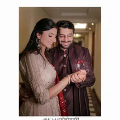 A beautifully composed shot of the couple, capturing a gentle, loving dance. The use of Hindi script for my brand name adds a personal, cultural touch.