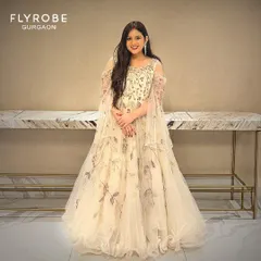 Simply enchanting. This client looks beautiful in a light, ethereal gown with delicate floral embroidery, rented for her special occasion.