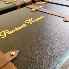 A detailed shot of a personalized leatherette trunk for a senior employee. This project for Axis Bank and Yes Bank highlights my focus on high-quality materials and individual customization, even in large orders.