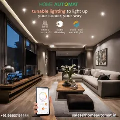 We create the perfect atmosphere with tunable smart lighting. As seen in this living room, you can easily adjust from cool, bright light for the day to warm, dim light for a relaxing evening, all controlled through our app.