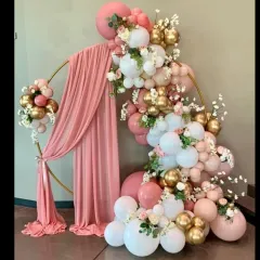 This gorgeous balloon arch in shades of pink, white, and gold with a draped ring is very versatile. I've used this design for baby showers, birthdays, and even Mother's Day celebrations.