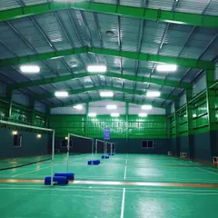 Our courts are always ready for your next game. This view shows the clean, marked playing surface and the bright, consistent lighting across the hall.