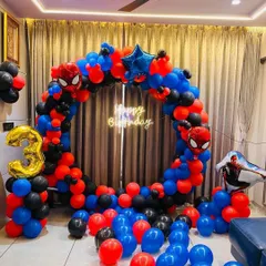 A Spiderman-themed balloon ring perfect for a superhero fan's birthday at home. The red and blue balloons, spider web details, and character foils create an action-packed look.
