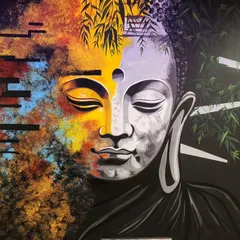 This abstract Buddha mural was designed for a spa to create a tranquil and modern atmosphere. We used a split-face design, blending vibrant, warm colors with a calm, monochrome palette to represent two sides of the same peaceful energy.