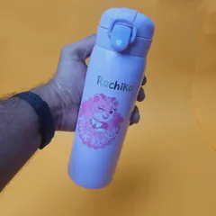 A cute pink-themed kids' bottle, personalized with the name "Rachika." I can customize these 500ml bottles with various themes and names.