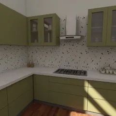 A close-up of the cooking area in our ATS Greens project. The olive green cabinets, terrazzo backsplash, and stainless steel chimney create a clean, modern, and highly functional workspace.