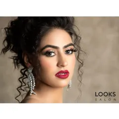 We create bold and glamorous looks perfect for any party or special event. This features a classic red lip, dramatic winged eyeliner, and luminous skin, a combination designed to make a powerful statement and turn heads.