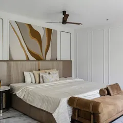 This is not a typical kids' room. We designed this bedroom in our Chennai project to evolve with age, using a sophisticated palette of neutrals, curved furniture, and an abstract art piece above the bed. It's a nod to maturity without losing the magic.