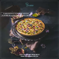 A delightful fusion of festive flavors in a creamy, eggless dessert tart. This modern creation is garnished with edible silver foil, rose petals, and pistachios, perfect for contemporary celebrations.