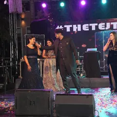 On stage during a Sangeet in Goa, engaging with the bride's family. I make it a point to involve key family members in the fun, creating special moments for them.