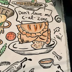 "Don't leave me c-al-zone!" I love adding food puns to my cafe murals. This calzone illustration was part of a larger food-themed artwork designed to be fun and memorable for customers.