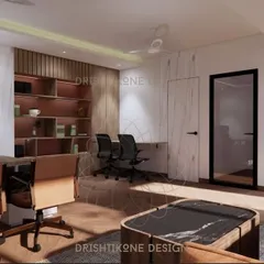 Another view of the modern office in Mathura, showing the executive desk area and the built-in shelving unit. The design uses a mix of wood, marble, and glass to create a sophisticated and layered look.