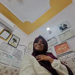 Another view of me in my studio, with my wall of fame. These certificates from various competitions and courses motivate me to keep learning and teaching.