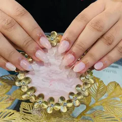 A perfect example of enhancing natural nails. This is a simple, clean, and healthy-looking set using a sheer pink strengthening gel.
