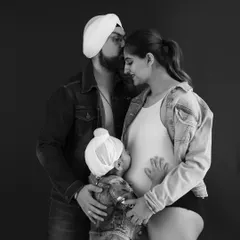 This tender family moment during a maternity shoot is a perfect example of the emotional, connected portraits I strive to create.