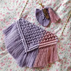 Stylishly carry your essentials with this dual-toned macrame sling bag in purple and pink. It even comes with a matching personalized leaf keychain.