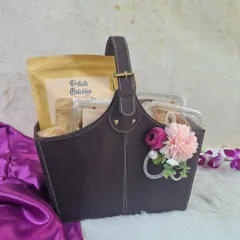 This elegant faux leather basket is a great option for corporate hampers. We can customize the contents according to your budget and deliver across India.