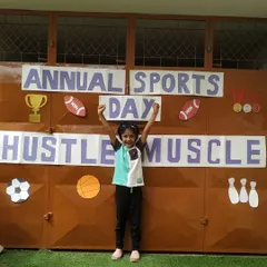 Pure joy and victory. One of our little champions celebrates her achievement during the Annual Sports Day. We encourage participation and sportsmanship in every child.